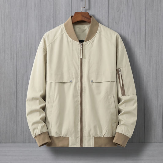 Khaki bomber jacket with tan ribbed collar on a wooden hanger