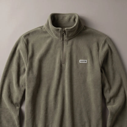 Flat lay of CLEAN FRONT FLEECE showing the tall stand collar and quarter zip