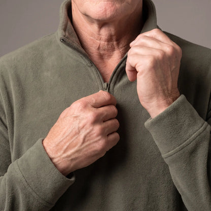 Man drawing up the quarter zip on the CLEAN FRONT FLEECE