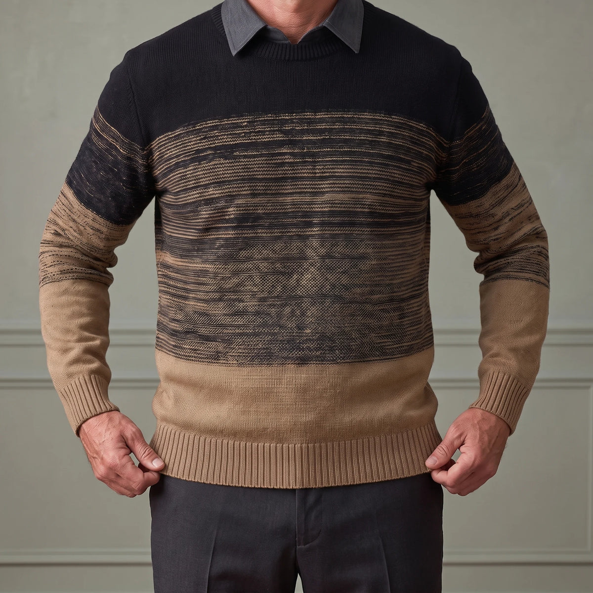 Man settling the ribbed hem of the khaki collar ombre sweater