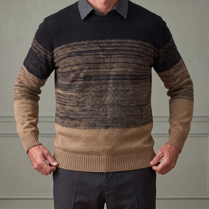 Man settling the ribbed hem of the khaki collar ombre sweater