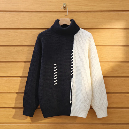 Men's black and cream colour block knit turtleneck on a wooden hanger