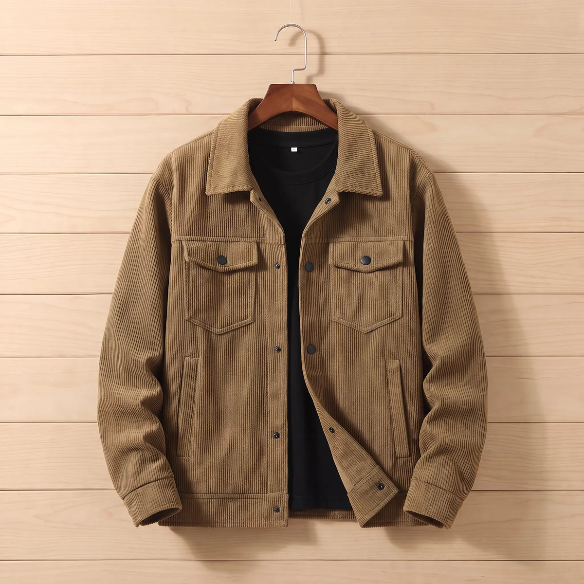 Corduroy chore jacket in brown on a hanger