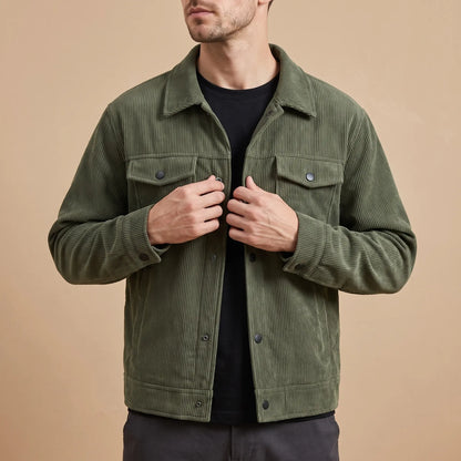Corduroy chore jacket worn, hands in the lower pockets