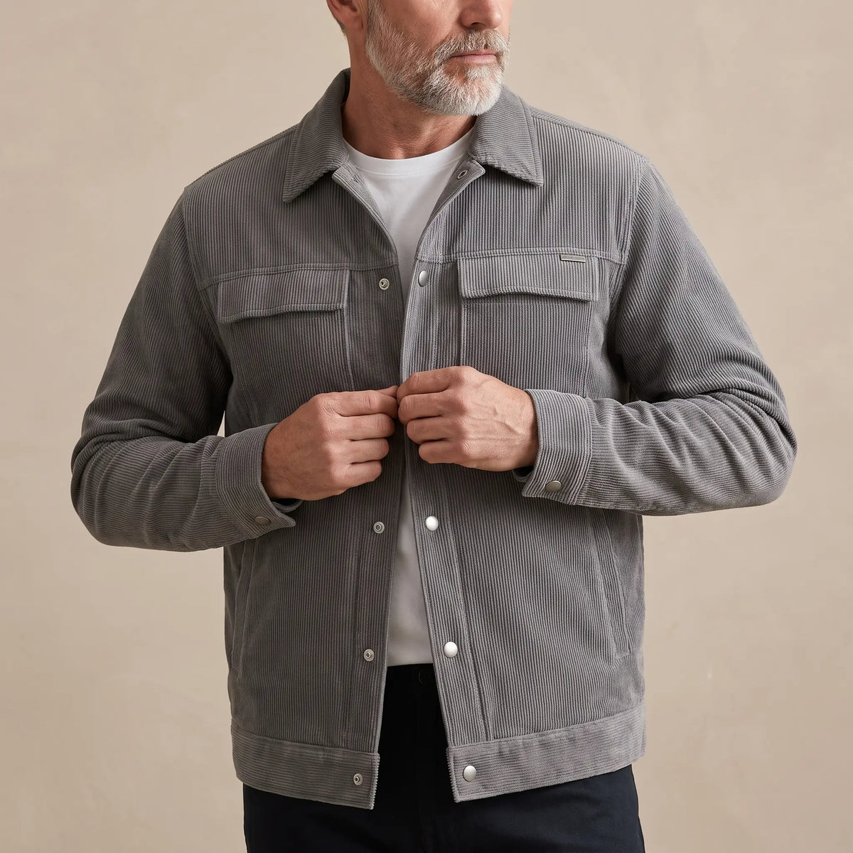 Corduroy Snap Jacket in Grey, worn over a white tee