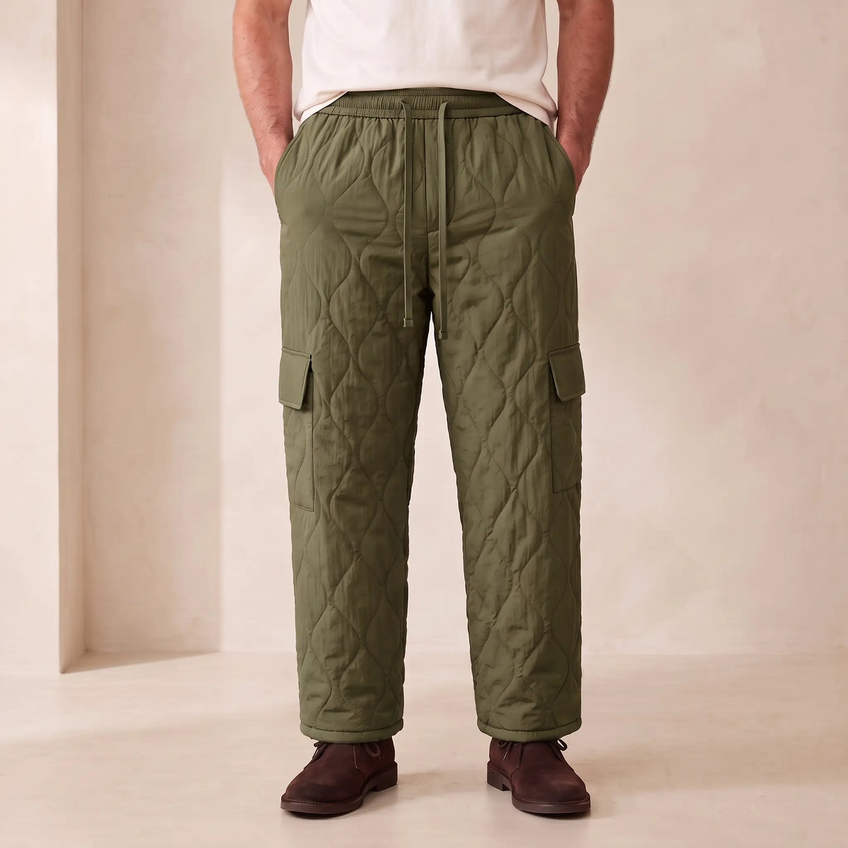 COSY QUILTED TROUSERS in army green, men's plush-lined quilted cargo trousers with drawcord waist