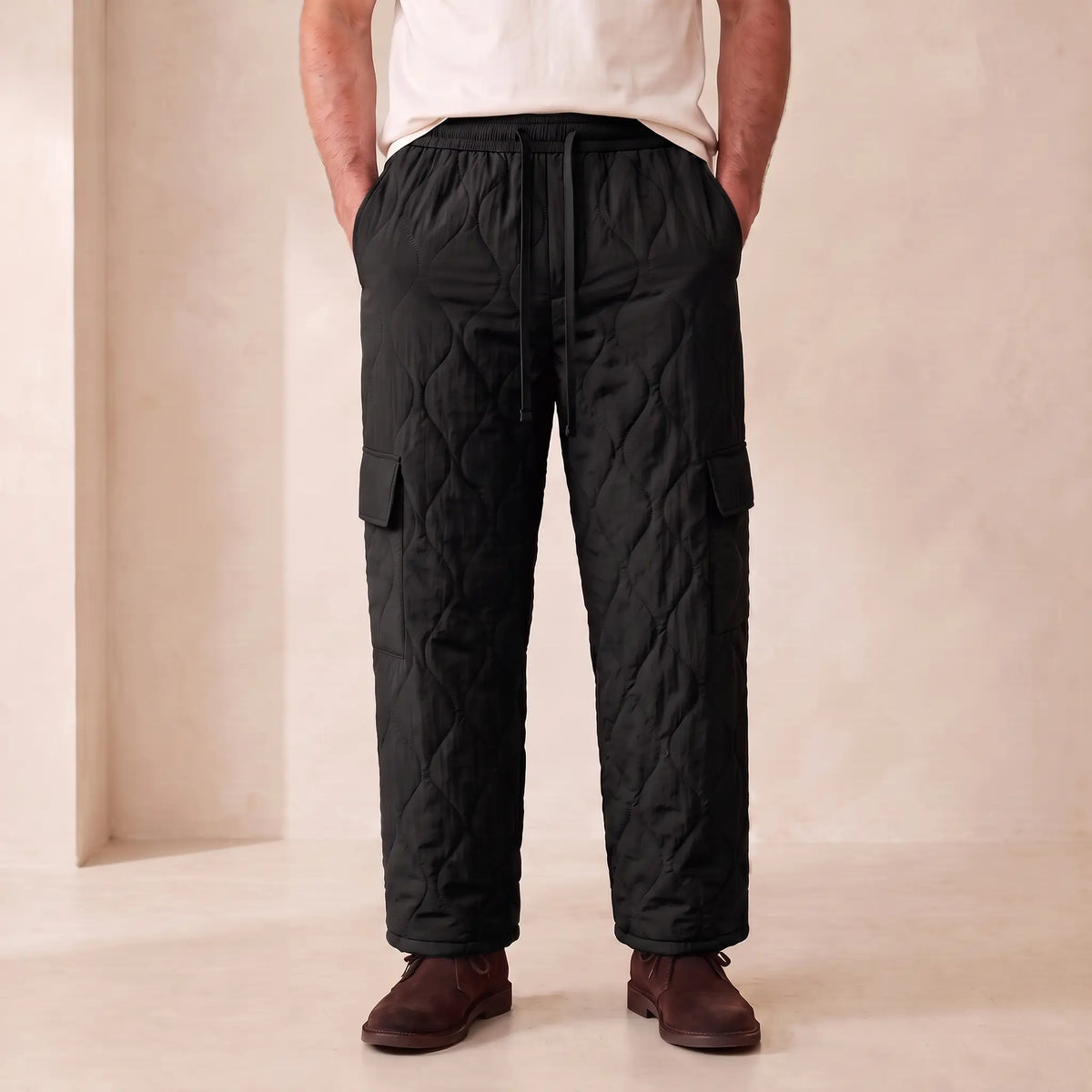 COSY QUILTED TROUSERS in black, men's plush-lined quilted cargo trousers with drawcord waist