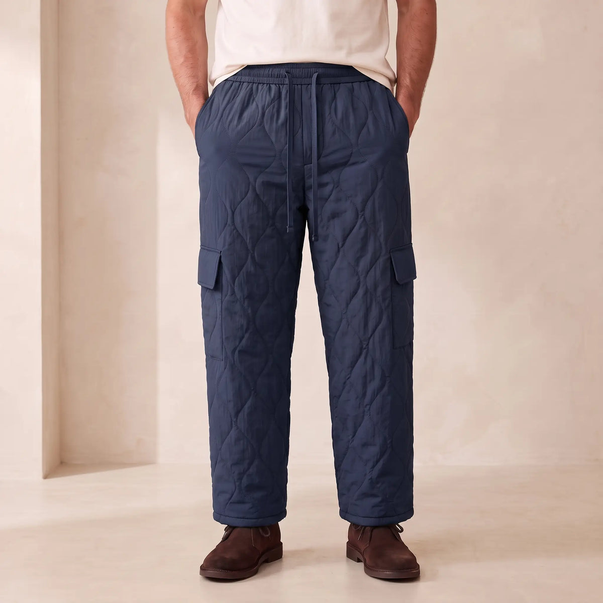 COSY QUILTED TROUSERS in blue, men's plush-lined quilted cargo trousers with drawcord waist