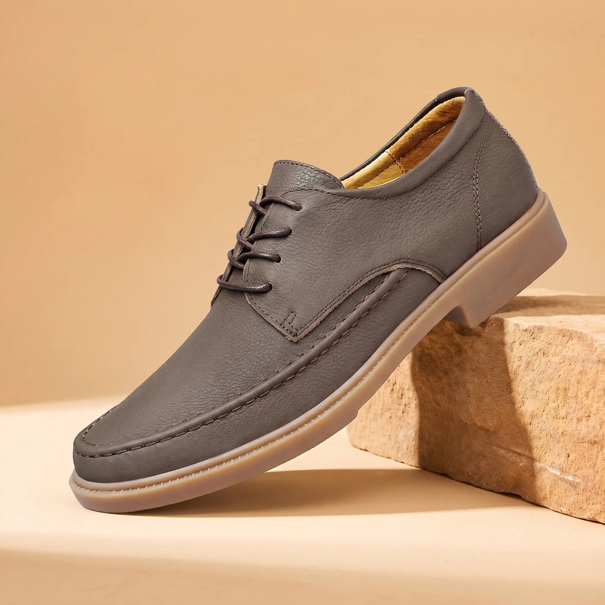 Cowhide moc toe shoe in brown