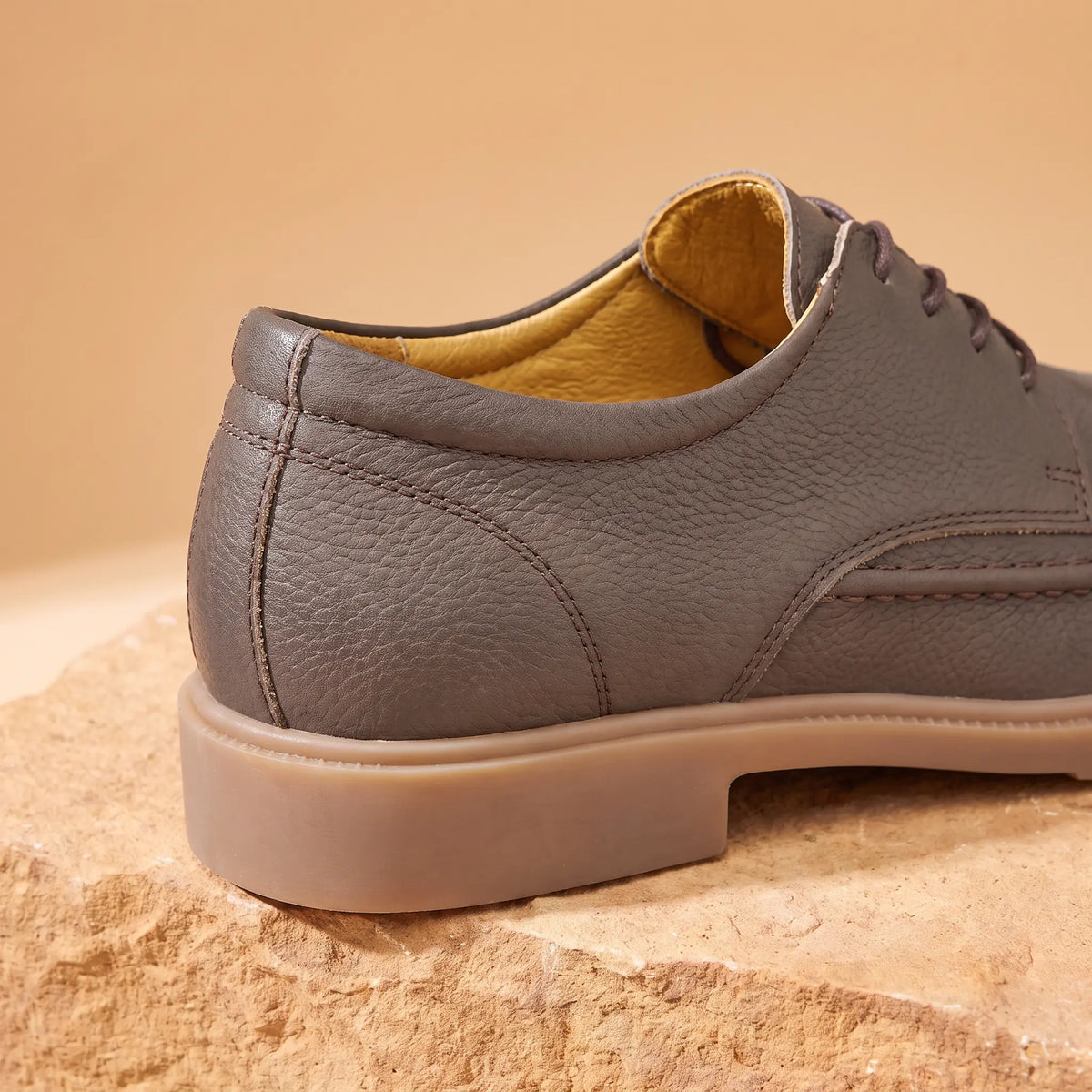Padded collar and stacked heel detail