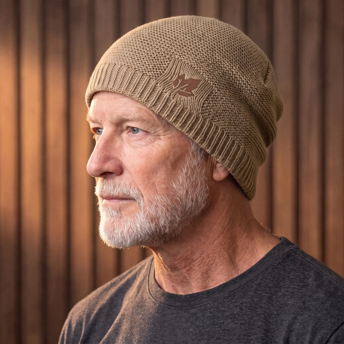 Khaki cuffed knit beanie for men worn with a turn-up cuff over the ears