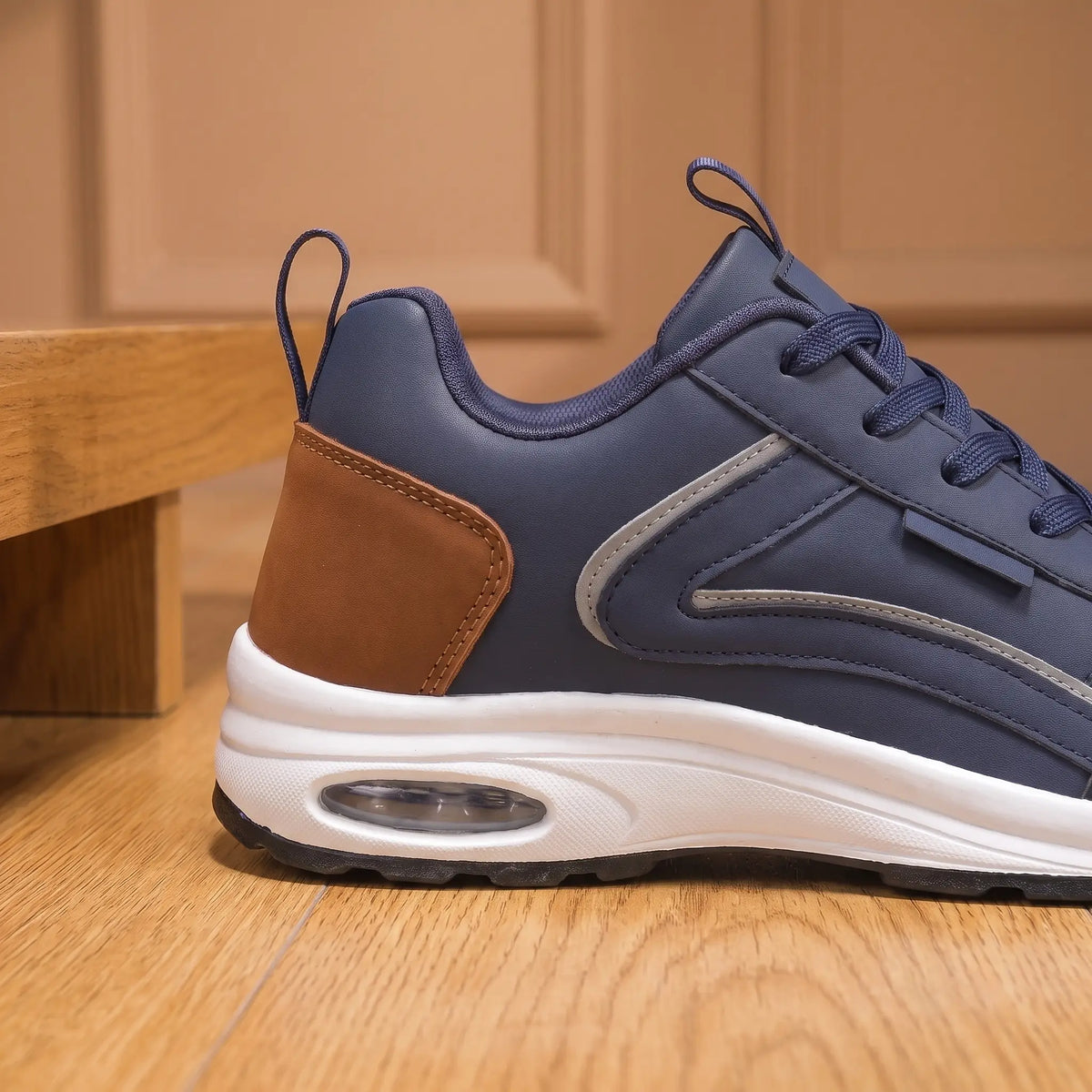 Cushion Step Trainers in Navy Blue, heel and air cushion close-up