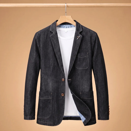 Denim sport blazer in black on a wooden hanger over a white tee