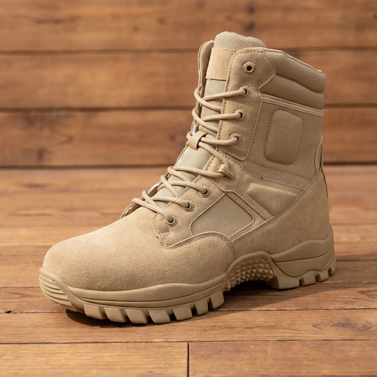 DESERT TACTICAL BOOTS in khaki, tall lace-up work boot with side zip and lugged sole on a wood floor