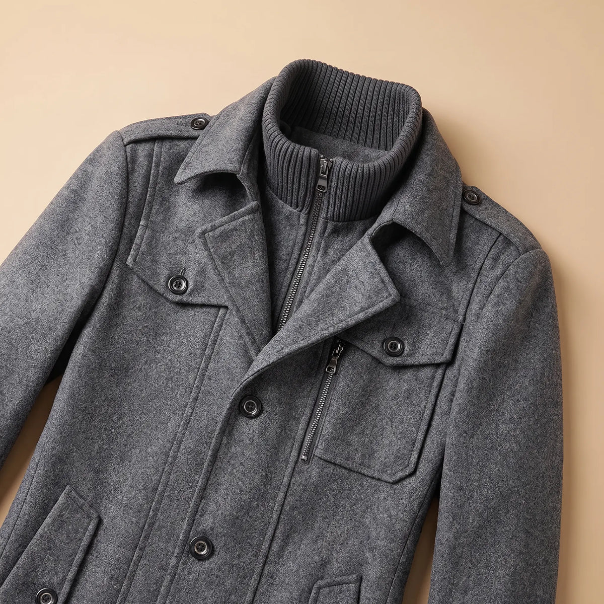 Close up of the DOUBLE COLLAR COAT collar, inner ribbed stand collar, epaulettes and chest pockets