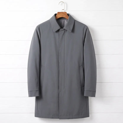 Grey down lined coat for men, mid-thigh car coat with hidden buttons on a wooden hanger
