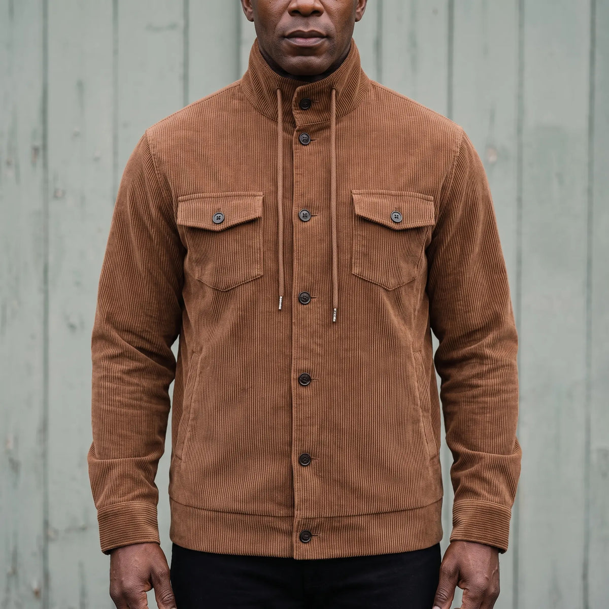 Men's brown corduroy button-front jacket with drawcord stand collar and chest pockets
