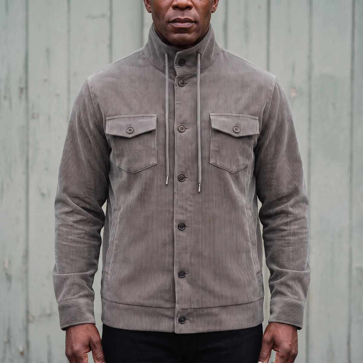 Men's light grey corduroy button-front jacket with drawcord stand collar and chest pockets