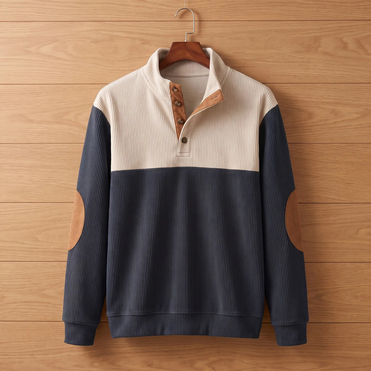 Ribbed knit pullover in navy blue on a wooden hanger