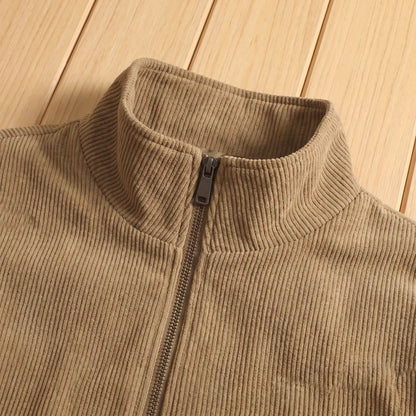Corduroy stand collar and zip detail