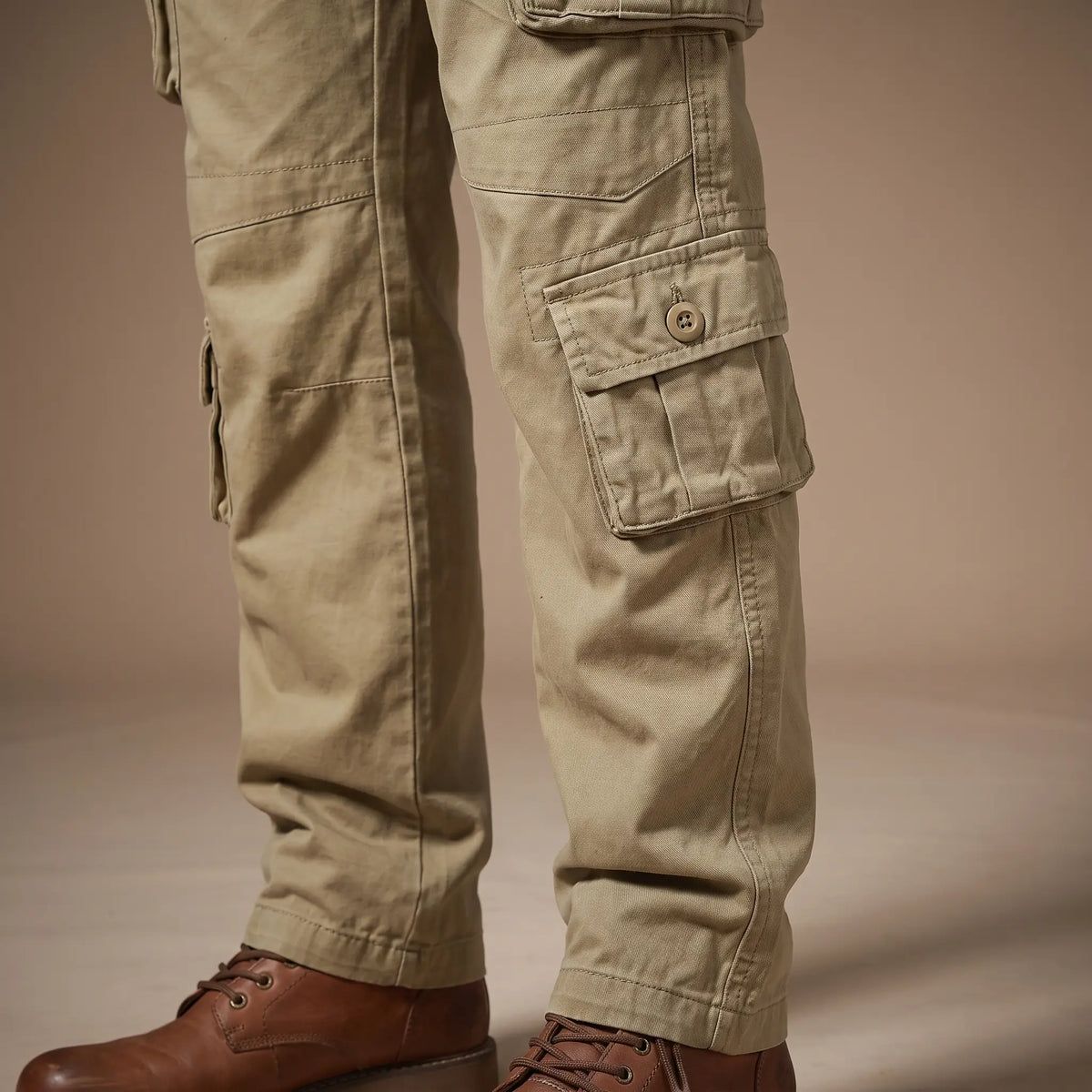 Close up of the FLAP POCKET TROUSERS lower leg pocket and hem