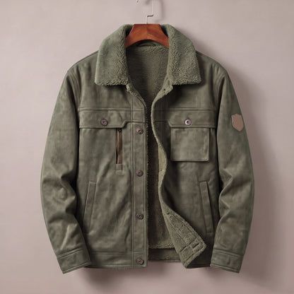 Green fleece lined trucker jacket on a wooden hanger
