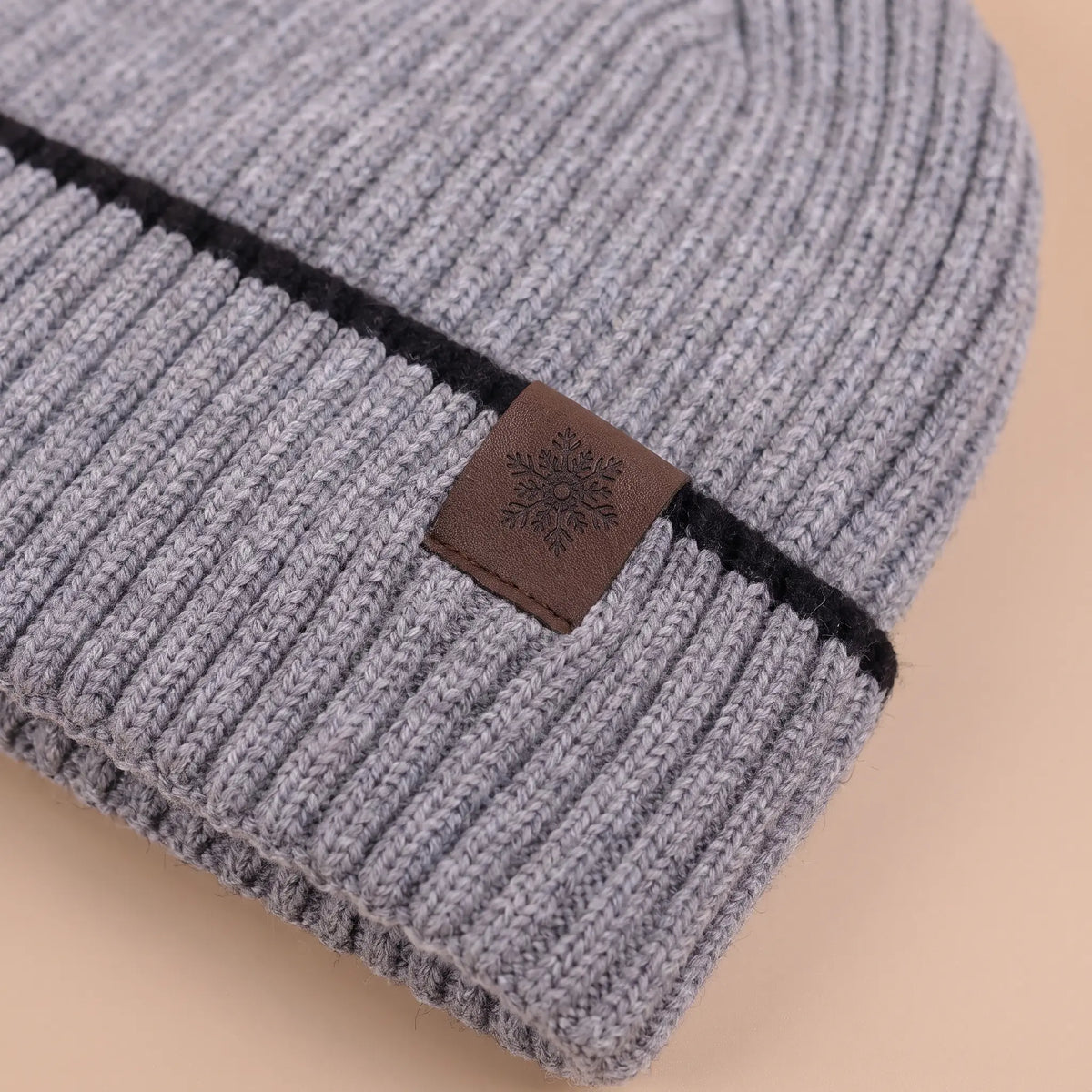 Cuff stripe and snowflake patch detail