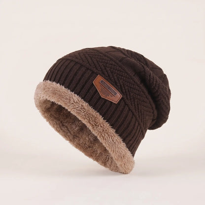 Men's brown fleece-lined slouch beanie with textured knit, tan fleece cuff and leather patch