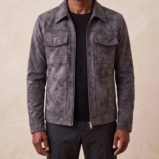 Frosted suede jacket in black worn open over a black tee by an older man