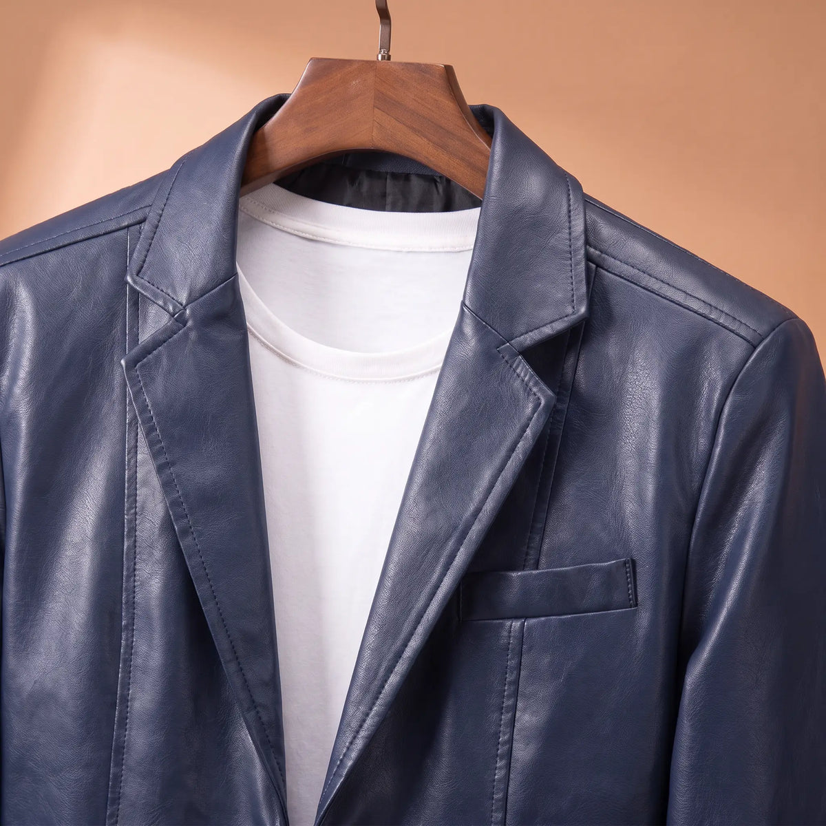 Glossy Finish Blazer lapel and chest pocket close-up