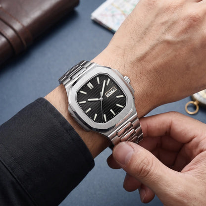 GLOW MARKER WATCH worn on the wrist - fastening the steel bracelet of the square black dial watch