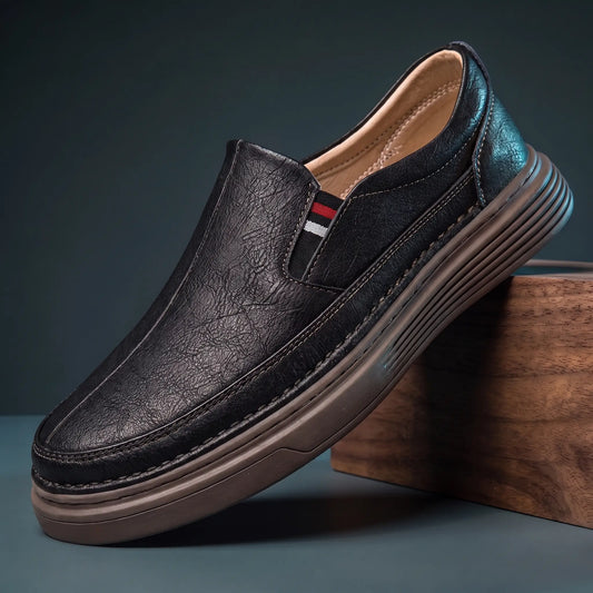 Black genuine leather slip on loafers with stretch gore panel and layered platform sole