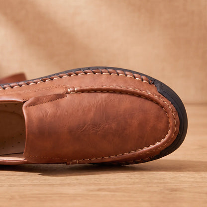 Hand Stitched Loafers in Brown, moc toe and whipstitched sole seam close-up
