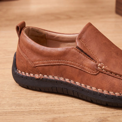 Hand Stitched Loafers in Brown, heel loop, side stitching and lining close-up