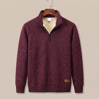 Heather knit sweater in deep red with sherpa-lined quarter-zip collar, on a wooden hanger
