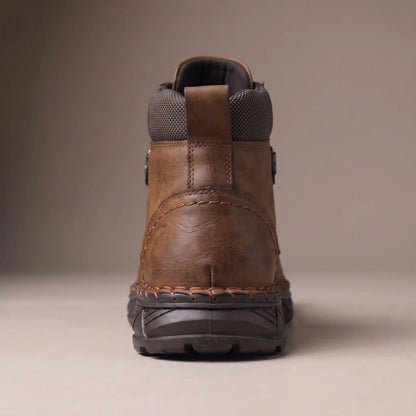 Close up of the heel, rear seam and padded collar on the brown heavy lug boot