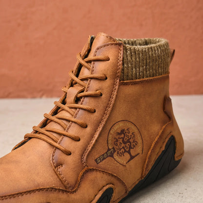 Close-up of the brown knit collar boot laces and side emblem