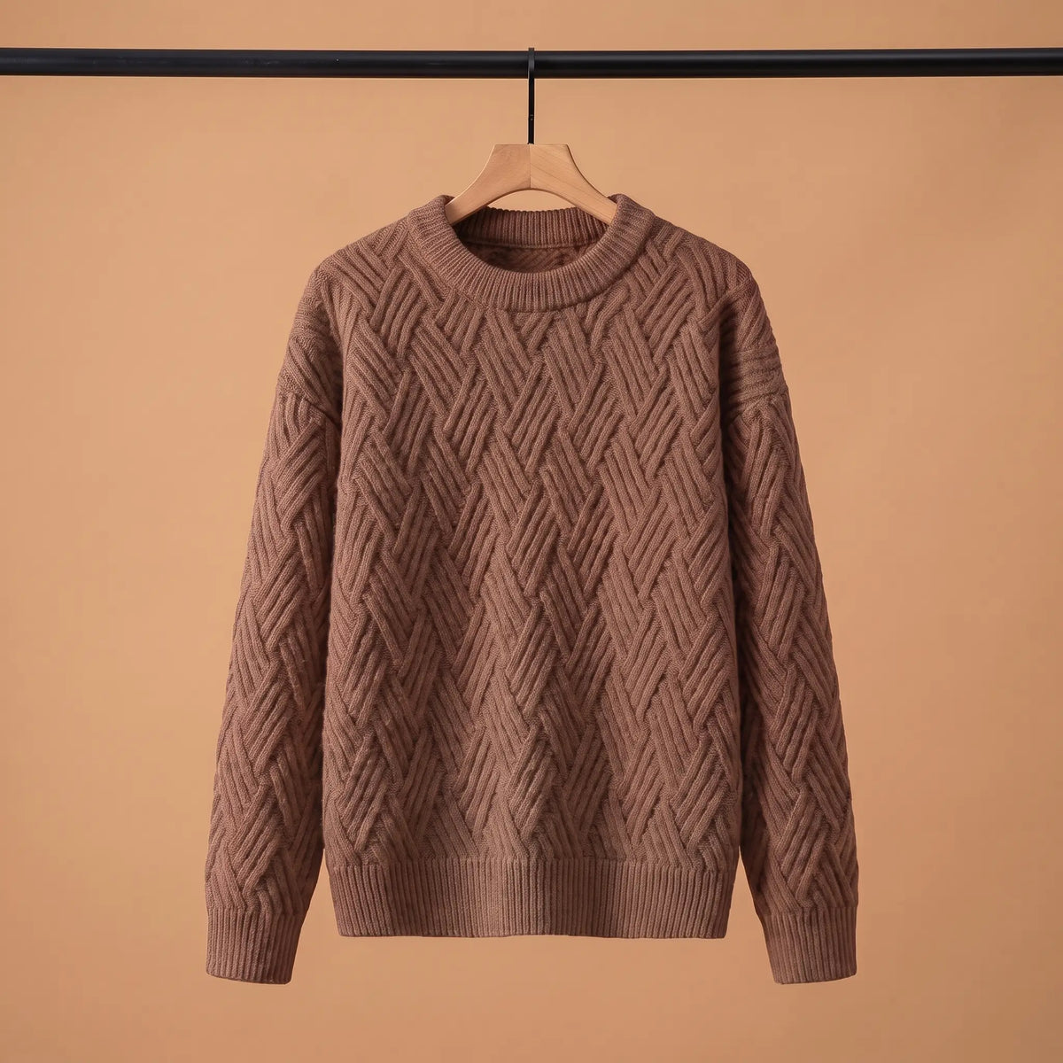 Men's brown lattice knit crew-neck sweater on a wooden hanger