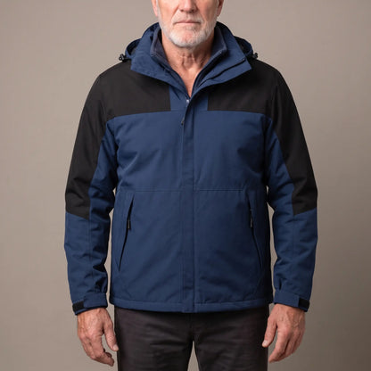 Men's navy blue hooded shell jacket with black shoulder panels and a zip-in fleece, worn zipped