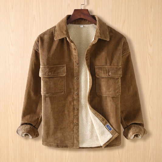 Layering Shirt Jacket in khaki, a fleece lined corduroy overshirt with two buttoned chest pockets on a wooden hanger