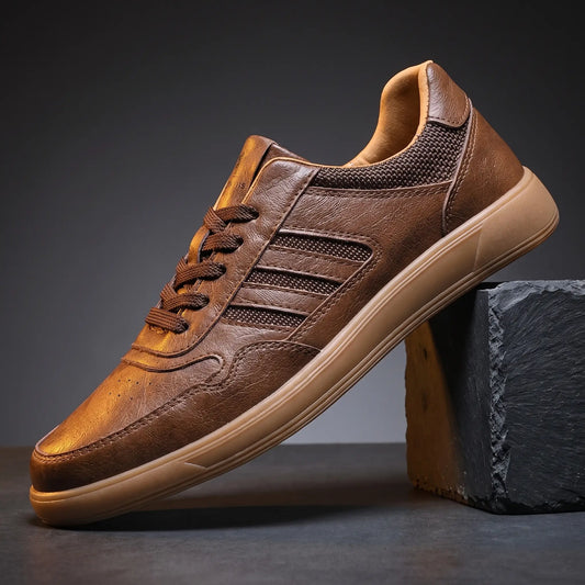 Brown leather court sneakers with four raised side bars and flat gum sole