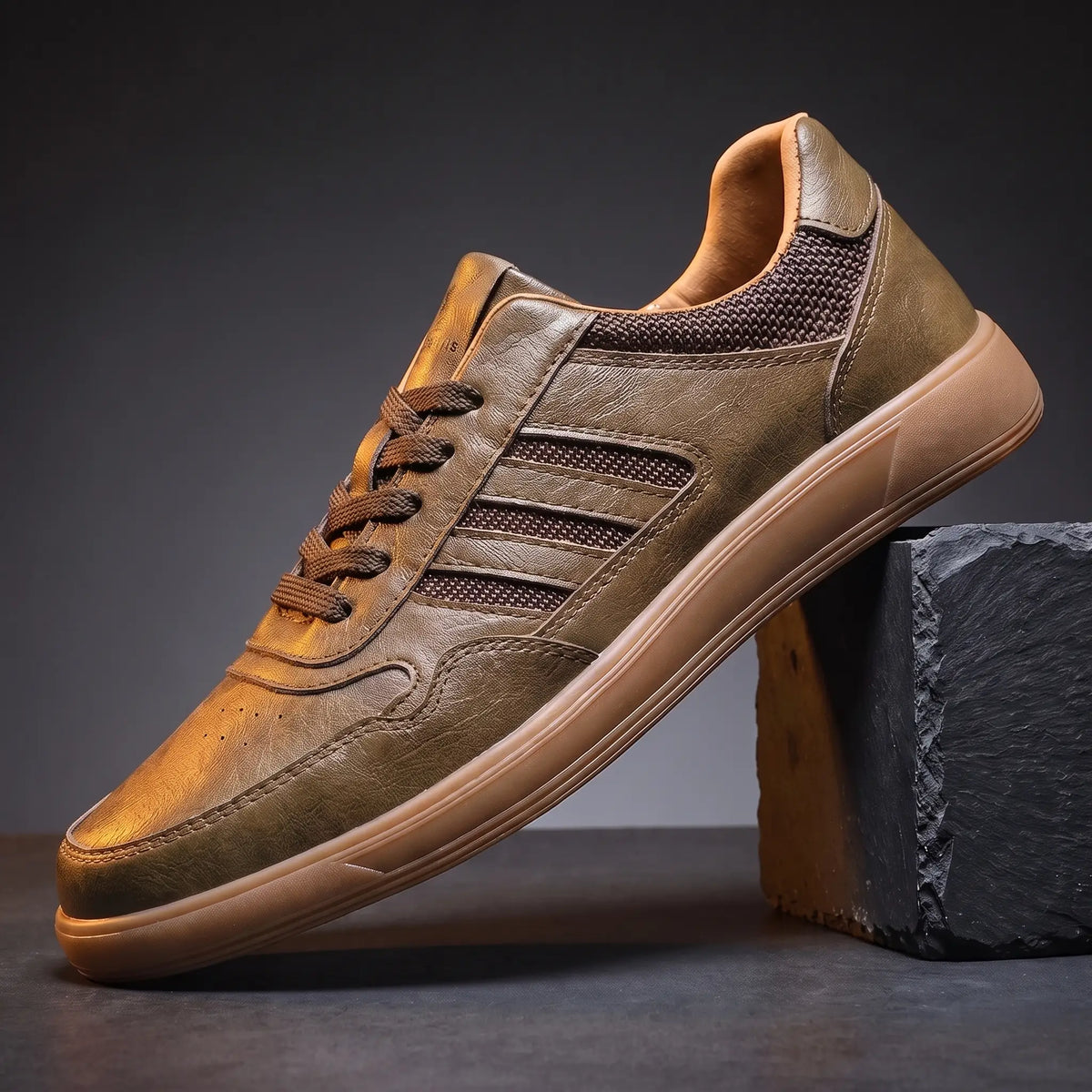 Khaki leather court sneakers with four raised side bars and flat gum sole