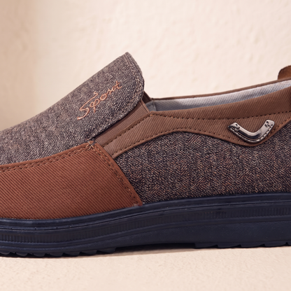 Close-up of the loafer instep, elastic gusset and metal side ornament