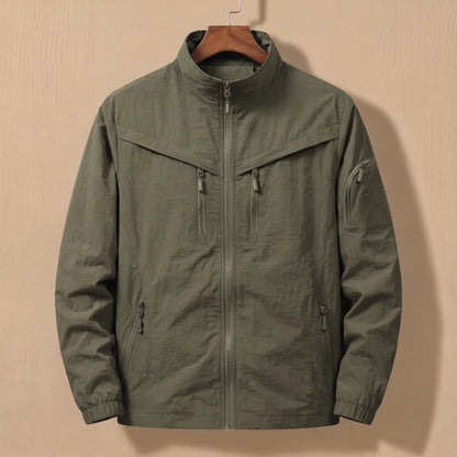 Men's army green lightweight utility jacket with five zip pockets on a wooden hanger
