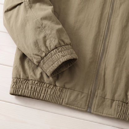 Jacket elastic cuff and hem detail