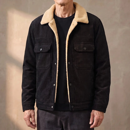 Black lined corduroy jacket with sherpa collar worn open by an older man