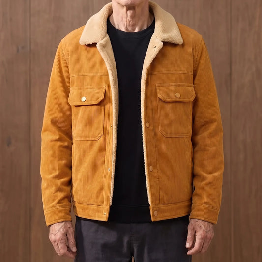 Mustard lined corduroy jacket with sherpa collar worn open by an older man