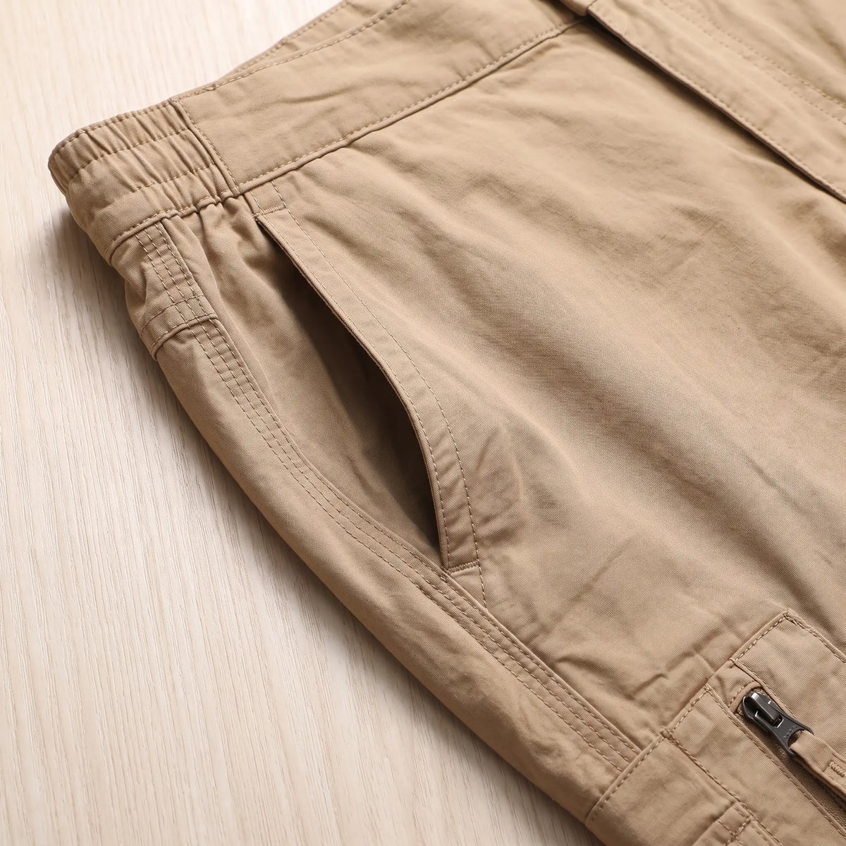 Long Cargo Shorts slanted hand pocket and elastic waistband close-up