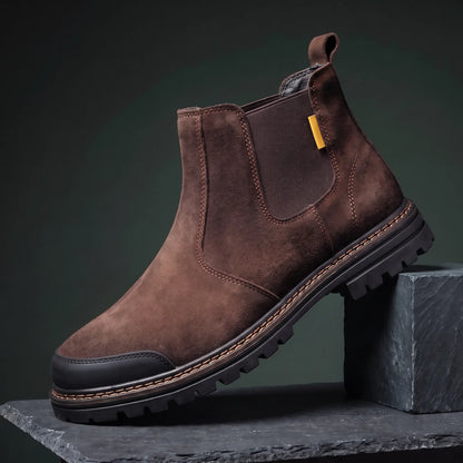 Brown slip on work boot with steel toe and lugged rubber sole