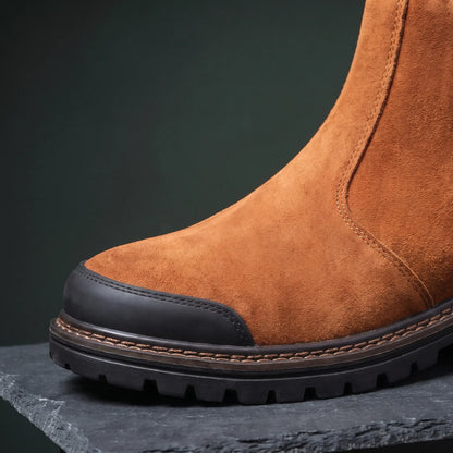 Close up of the reinforced toe and stitched welt on the work boot